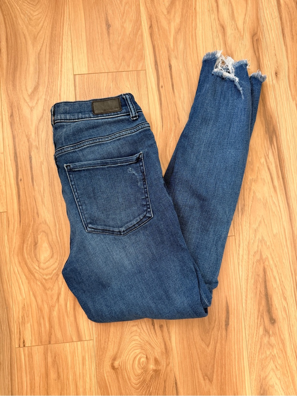 Express Women's Mid Blue Skinny Jeans with Frayed Hem
